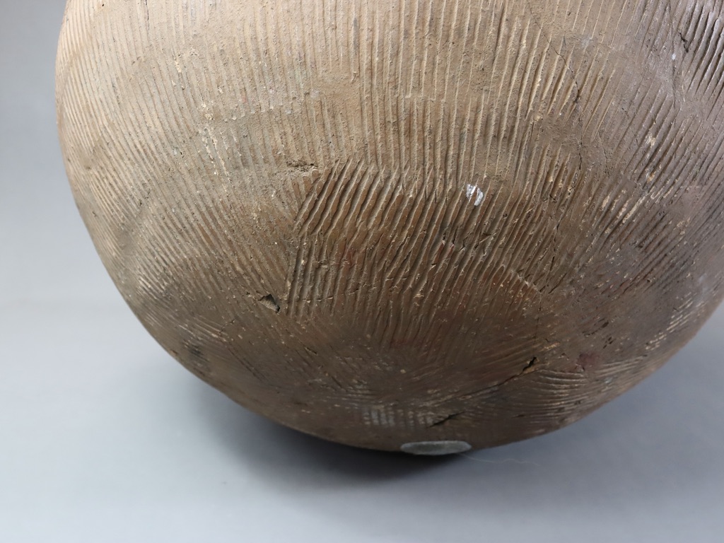 A large Nigerian vesselpottery, spherical with five pairs of mounds to the shoulders and with - Image 7 of 7