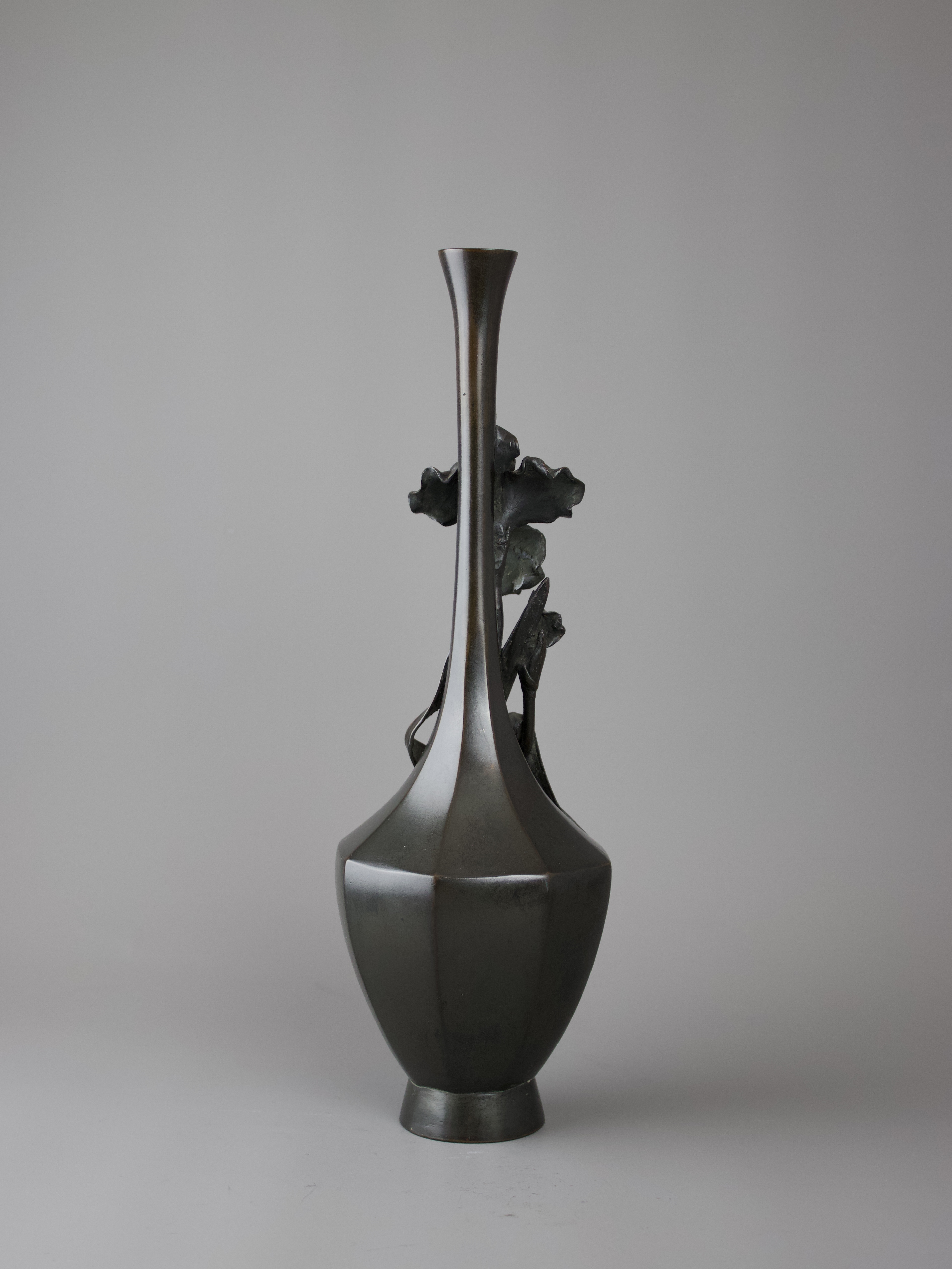 A Japanese Bronze Iris Vase, Meiji periodthe elegant tall bottle vase of hexagonal section with - Image 5 of 7