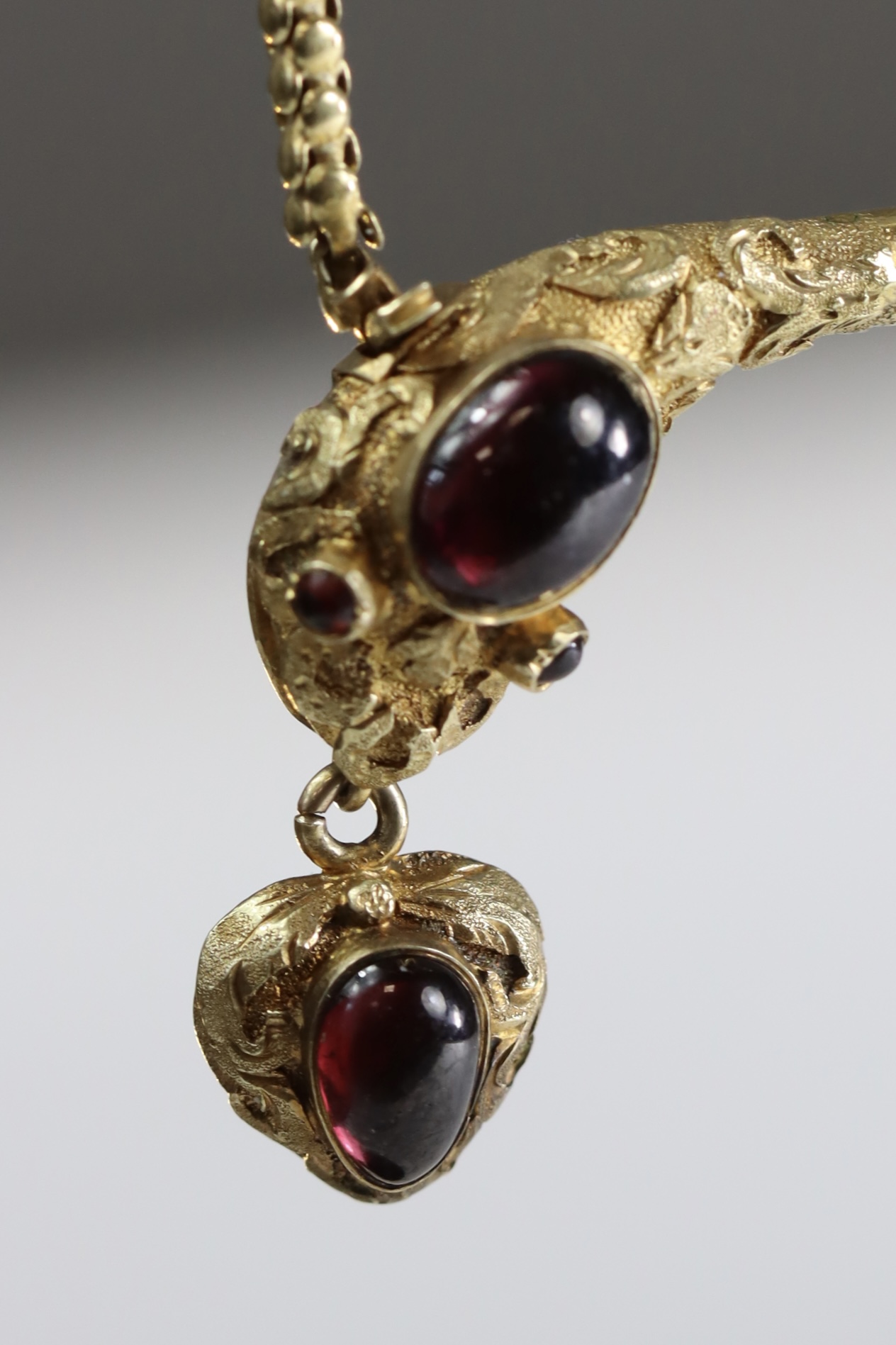 An Attractive Antique Cabochon Garnet and Yellow Gold Snake Pendant, circa 1870,the head formed from - Image 7 of 10