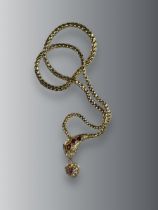 An Antique Two coloured Gold, Ruby and Diamond Snake Necklace, circa 1860,the head formed of three