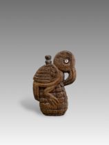 A Huari Wari Culture Wooden Snuff Vessel with Flamingo. Peru ca. 500-1000 AD.A wonderful wooden