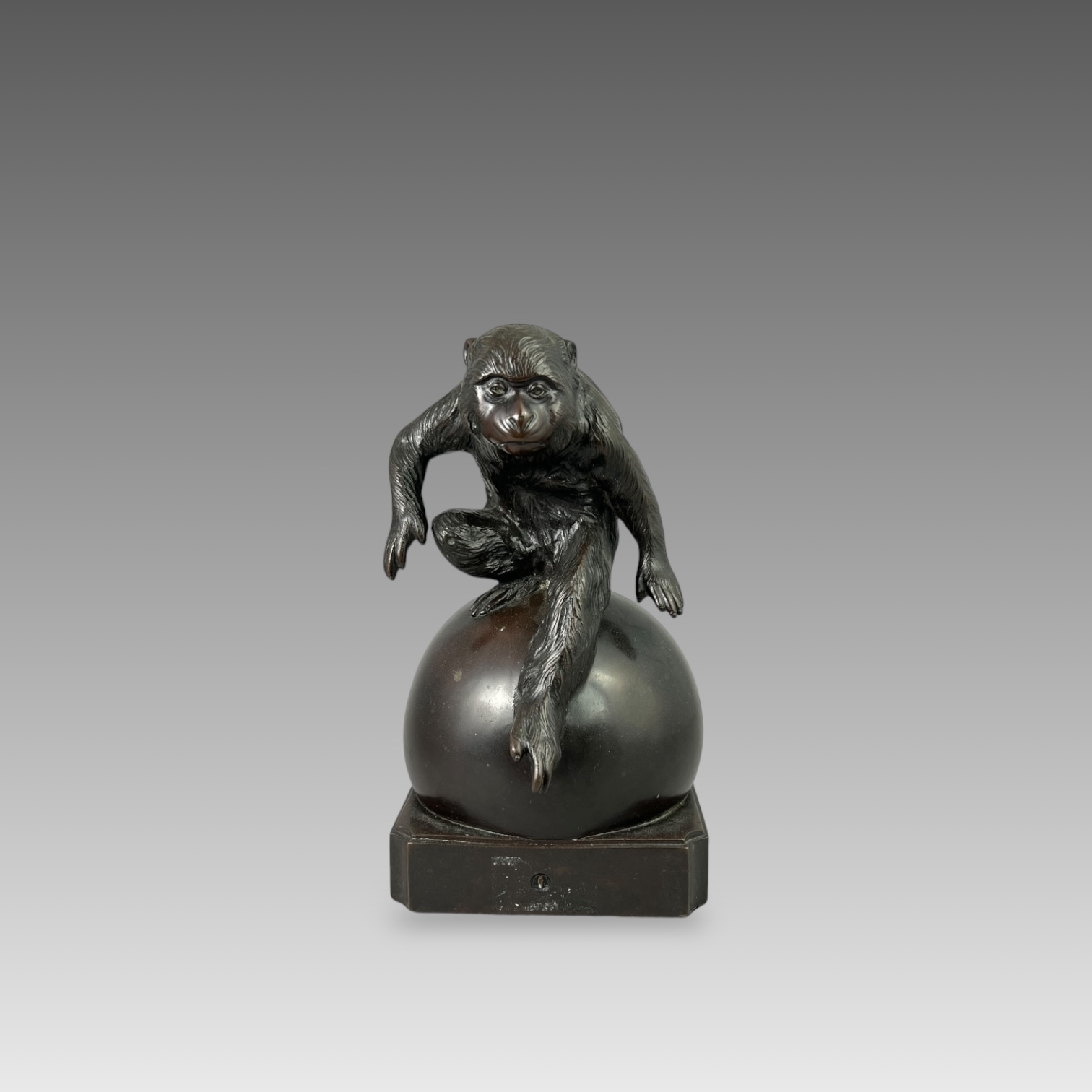 A Bronze Monkey, Meiji/Taisho periodthe lively animal poised as if to spring off the sphere he