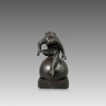 A Bronze Monkey, Meiji/Taisho periodthe lively animal poised as if to spring off the sphere he