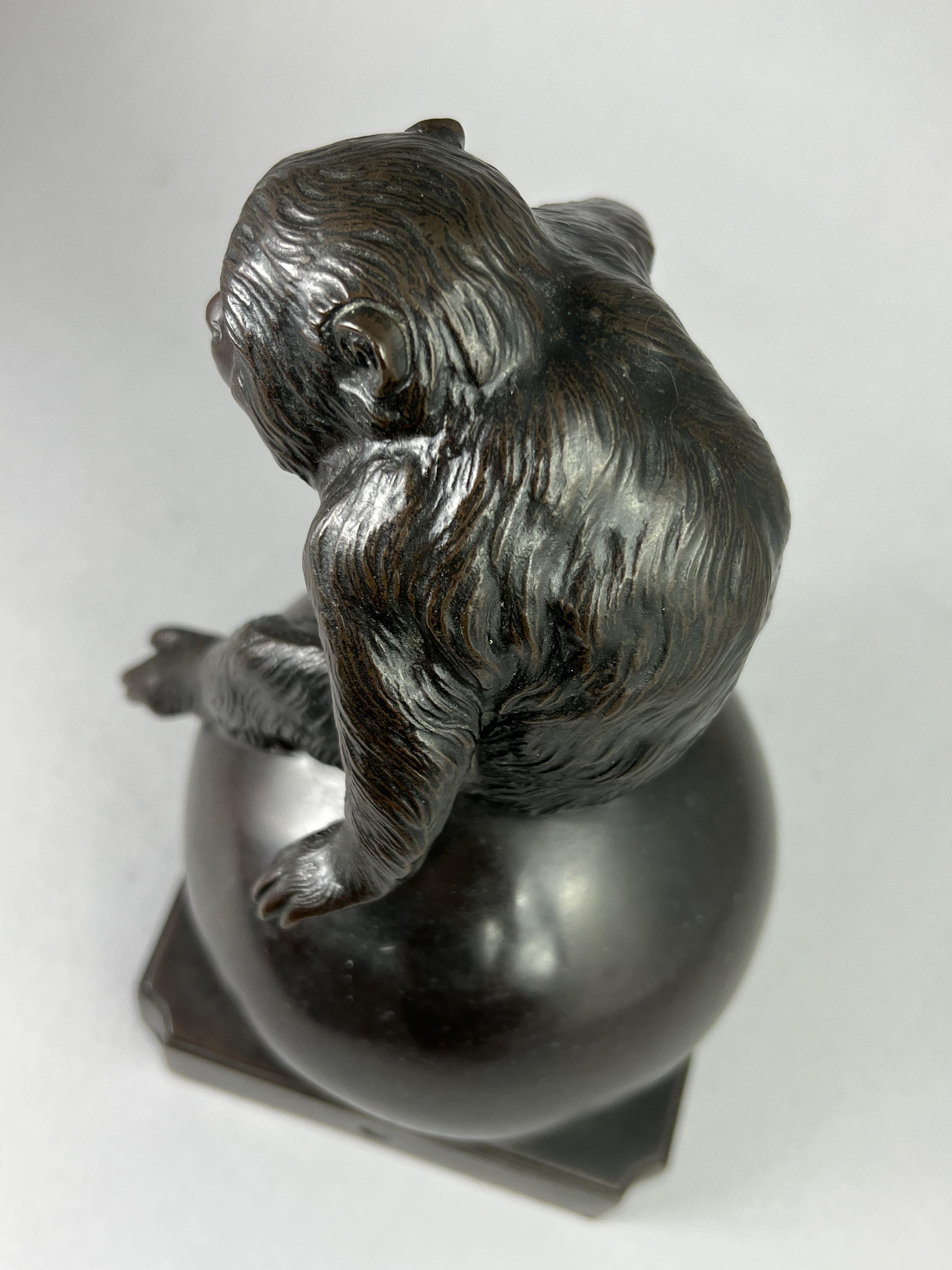 A Bronze Monkey, Meiji/Taisho periodthe lively animal poised as if to spring off the sphere he - Image 9 of 10