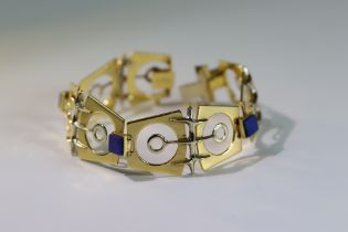 An Italian 18k Gold Bracelet set with Lapis lazuli, designed by Galoppi. Fully signed. Weight 44.