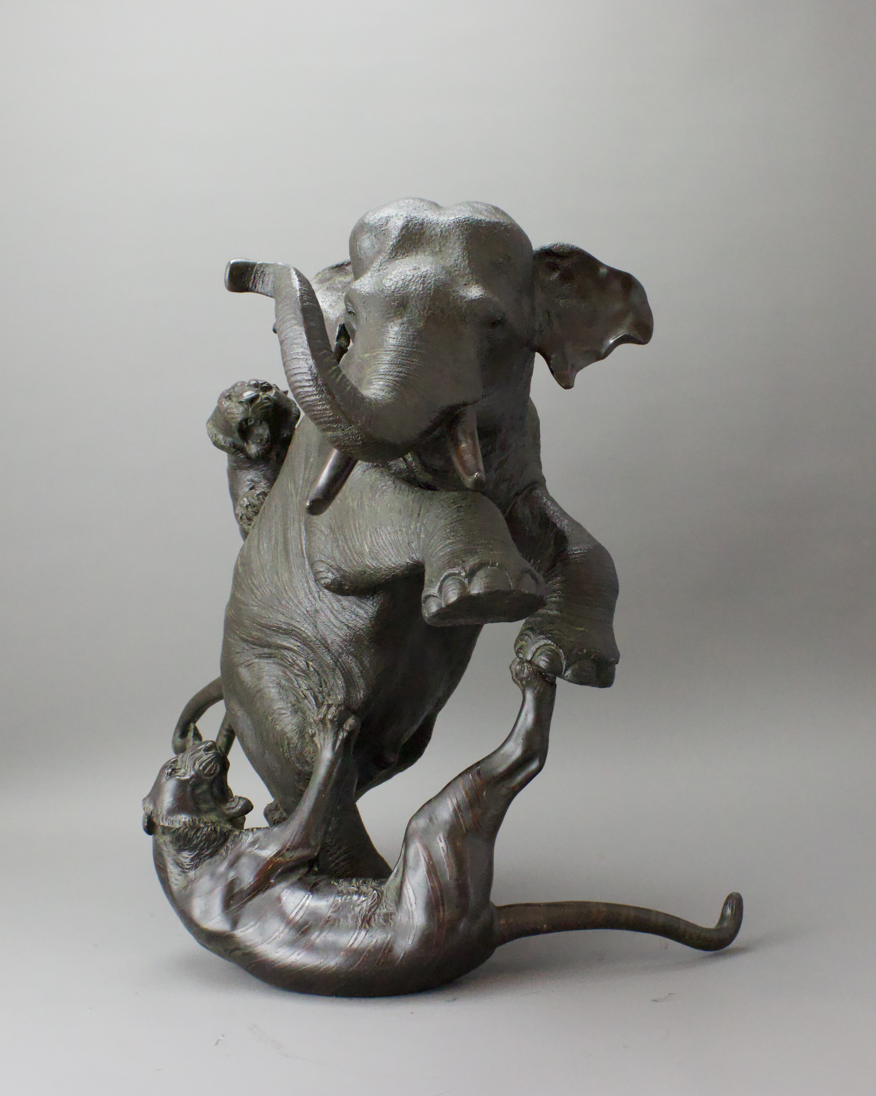 A Japanese Bronze Elephant and Tigers Group, Meiji period,with one seal, the enraged elephant in - Image 3 of 14