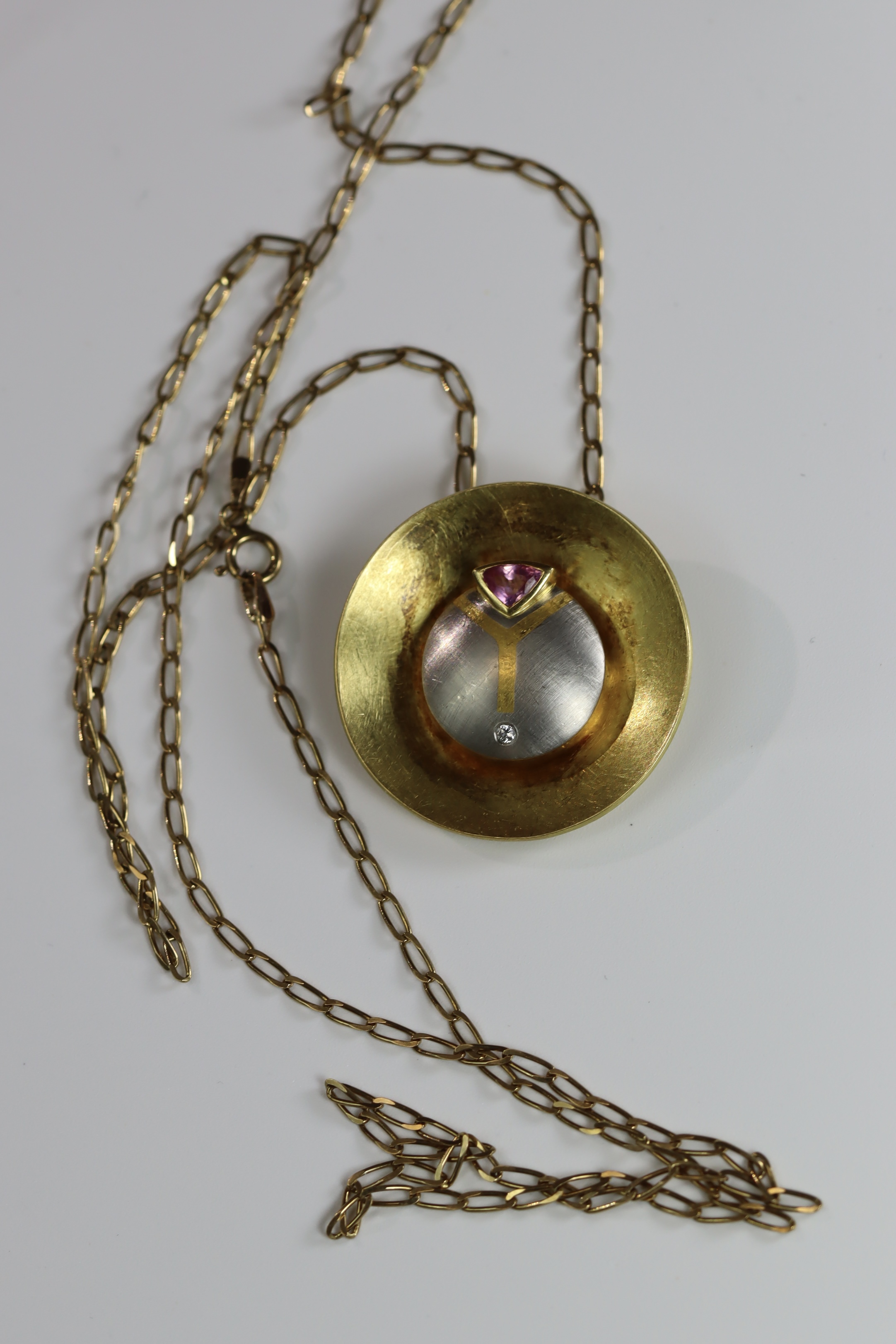 An Unusual Gold, Platinum, Diamond and Ruby Disc Pendant, on a long chain, chain set in 9 ct gold, - Image 5 of 10