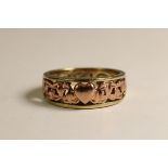 Cariao: A Rose Coloured Gold and 9 ct Yellow Gold Heart and Scroll Band Ring Cariao: A Rose Coloured