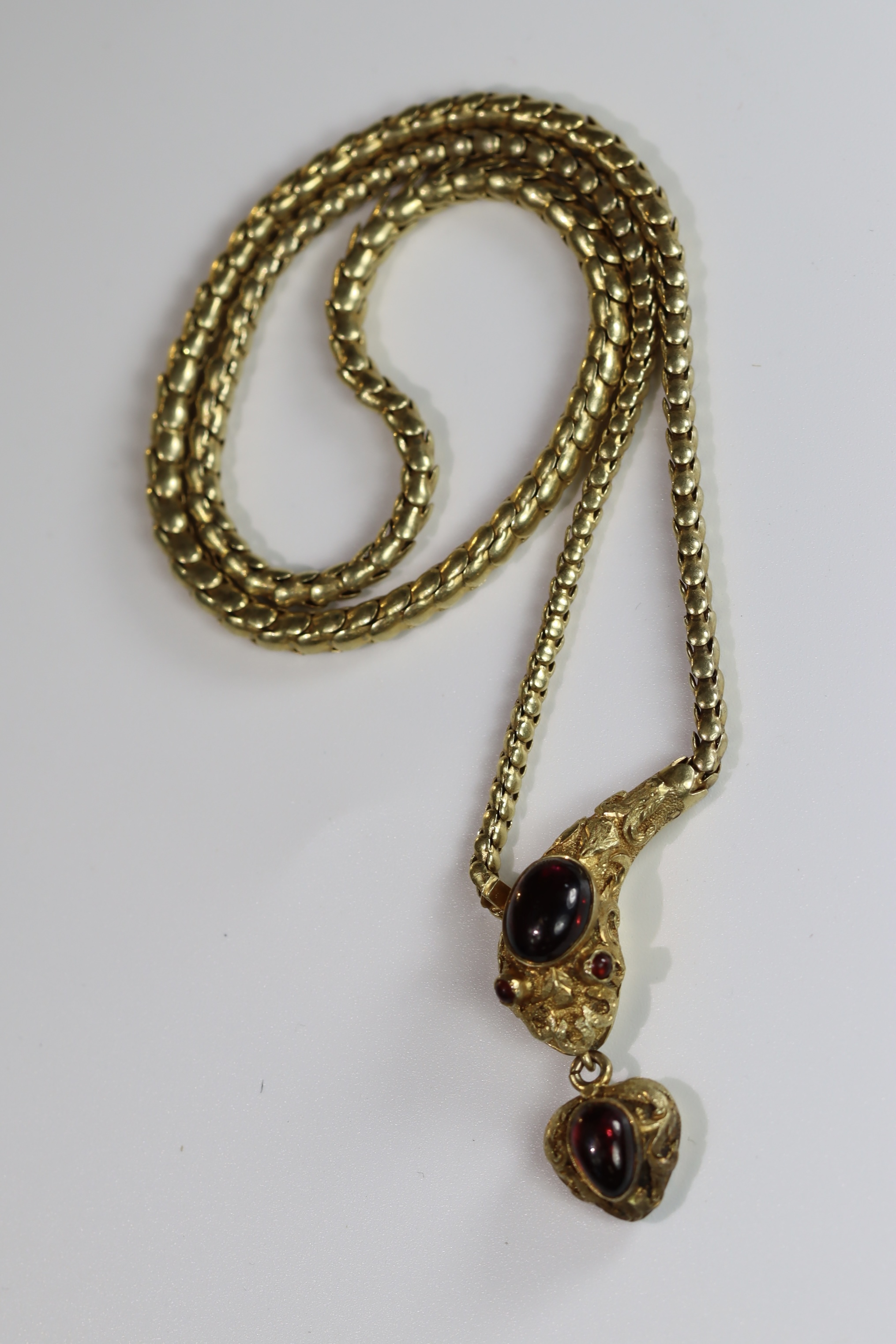 An Attractive Antique Cabochon Garnet and Yellow Gold Snake Pendant, circa 1870,the head formed from - Image 4 of 10