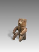 A Qimbaya Culture â€˜retabloâ€™ figure. Colombia ca. 1000-1400 AD.The terracotta seated figure