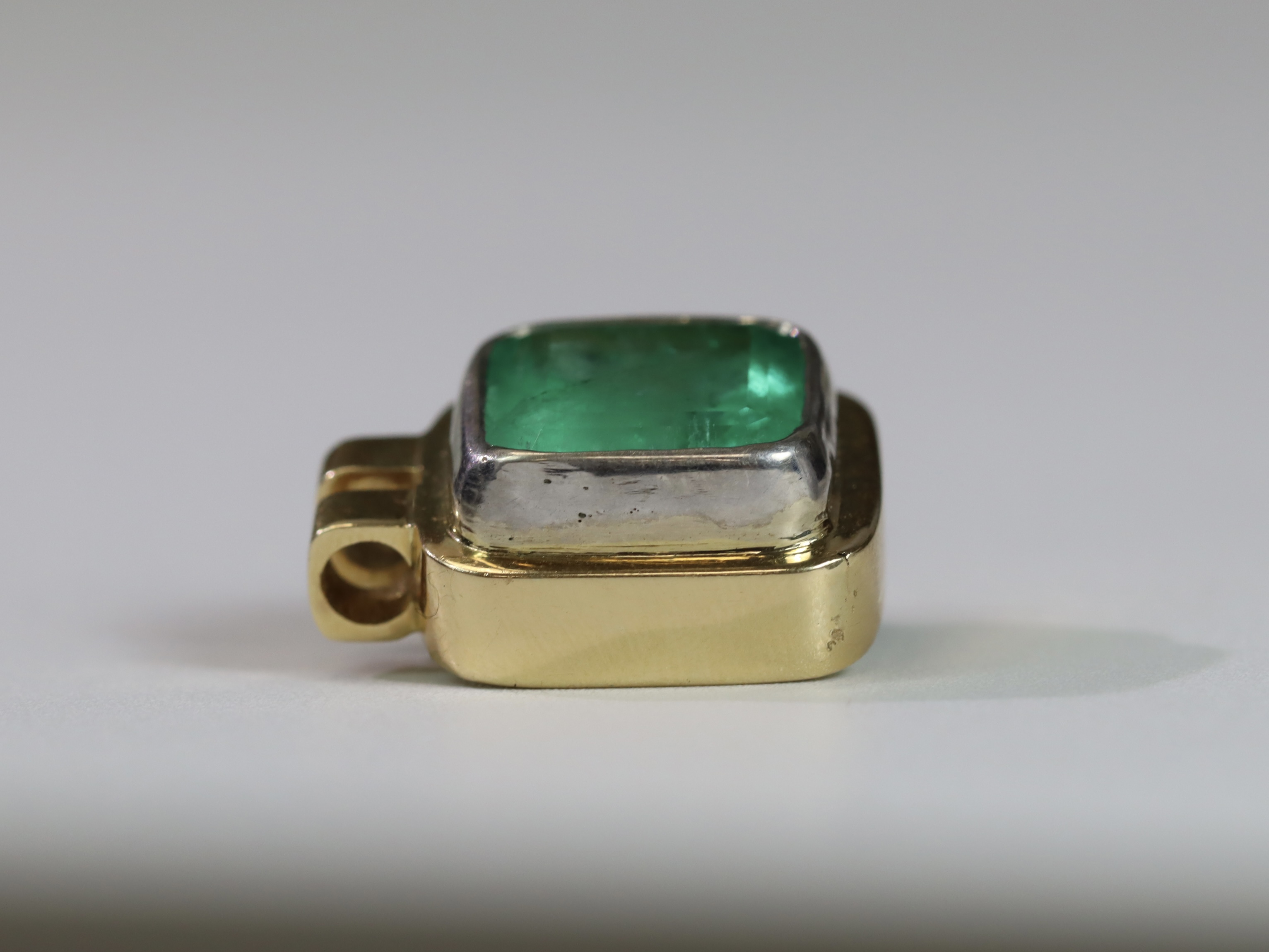 A Large Emerald Single Stone Pendant, the cushion shaped single stone emerald weighing approx. 12 - Image 6 of 10
