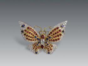 A Pretty Diamond, Ruby and Sapphire Butterfly Brooch,finely mounted in 18 carat gold and platinum,