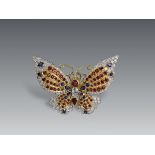 A Pretty Diamond, Ruby and Sapphire Butterfly Brooch,finely mounted in 18 carat gold and platinum,