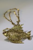 G. Weil. An 18k Gold Fish shaped pendant set with diamonds, no date mark but definitely 1970s.