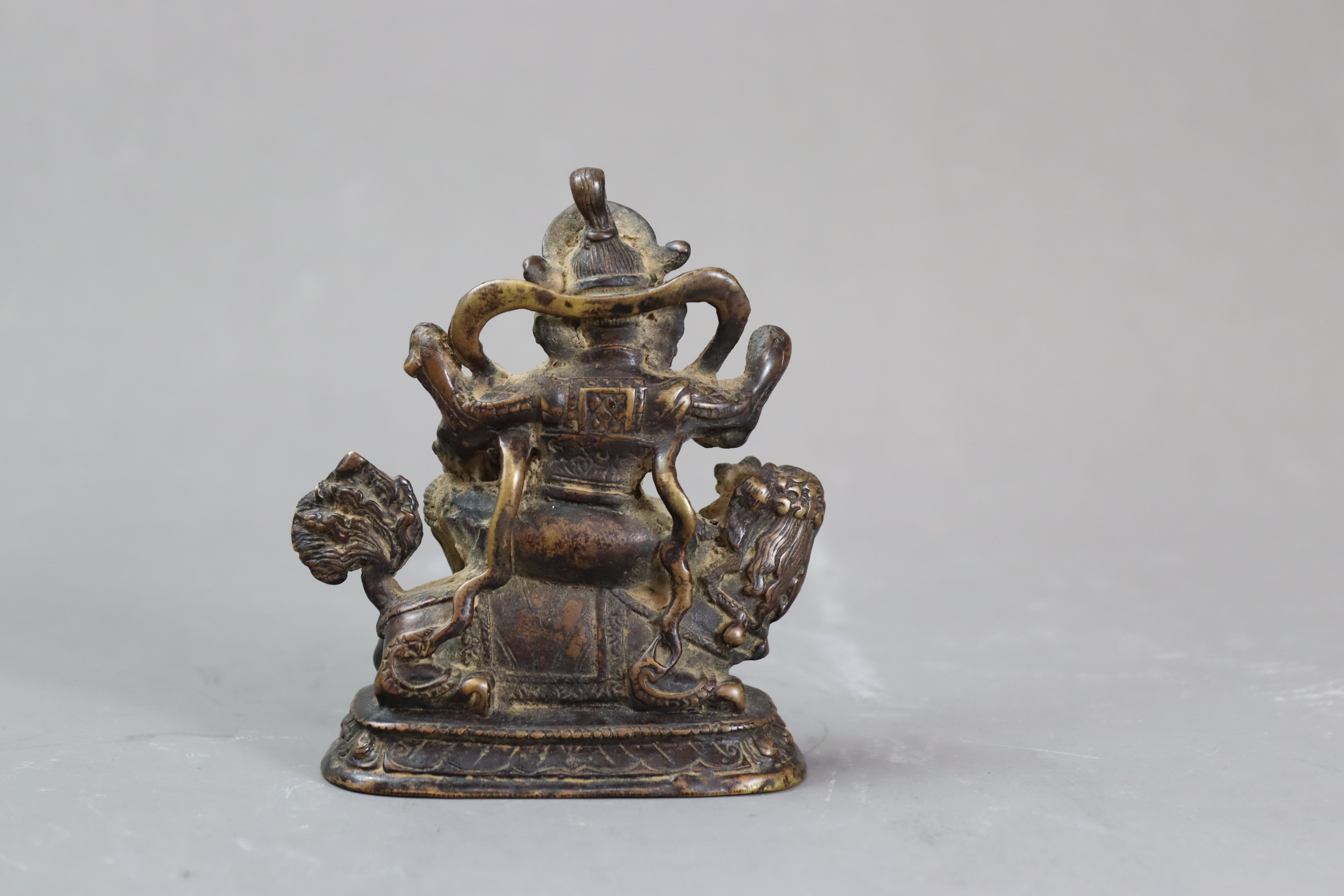 A Bronze God of Fortune, 19/20th centurythe fierce bearded deity clutching his mongoose, with dark - Image 5 of 8