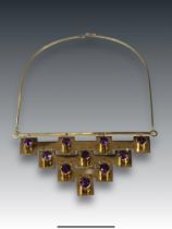 A Striking 18k Gold and Amethyst Necklace,. circa 1970s, designed by the Ecuadorean artist