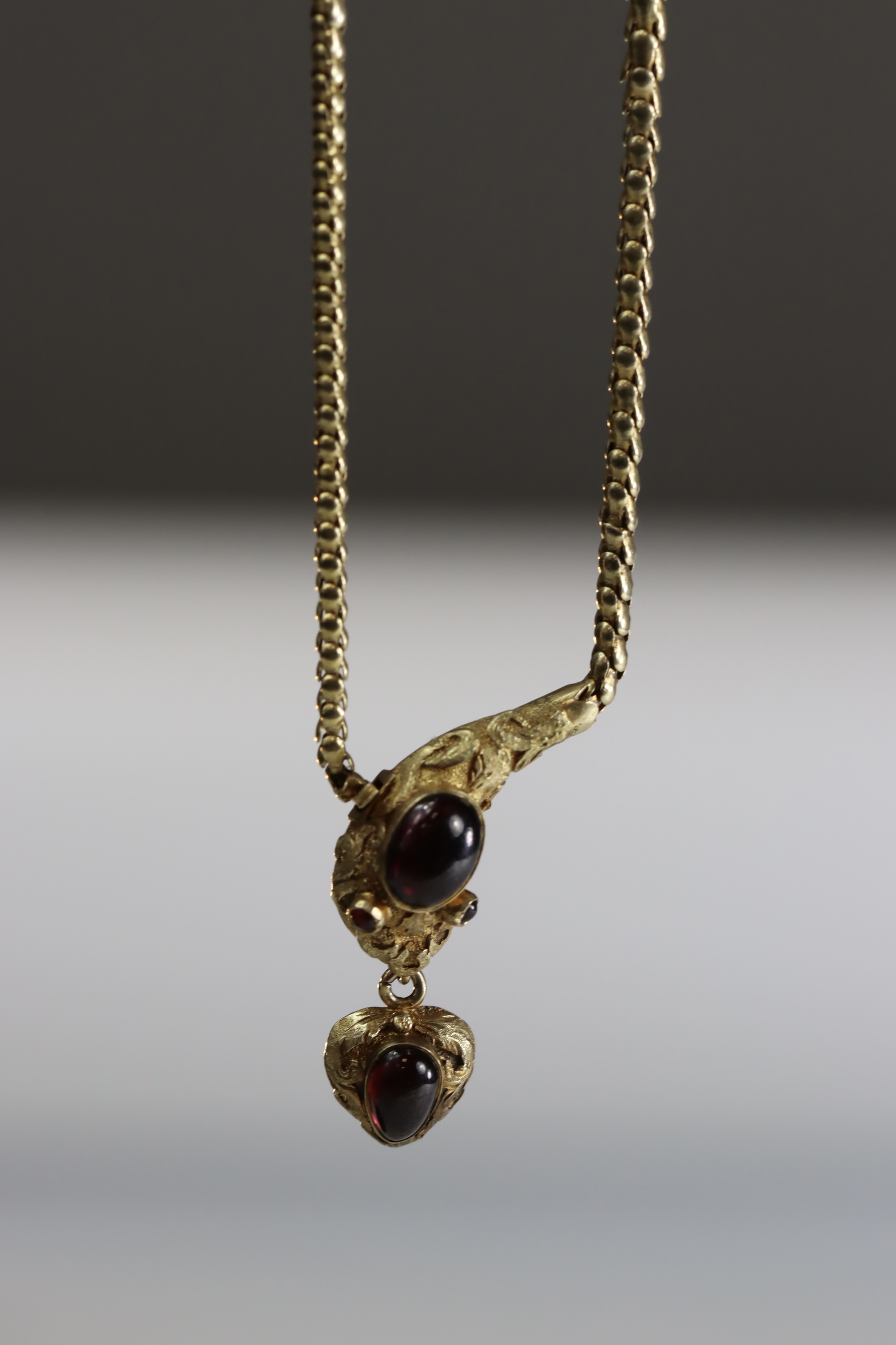 An Attractive Antique Cabochon Garnet and Yellow Gold Snake Pendant, circa 1870,the head formed from - Image 9 of 10