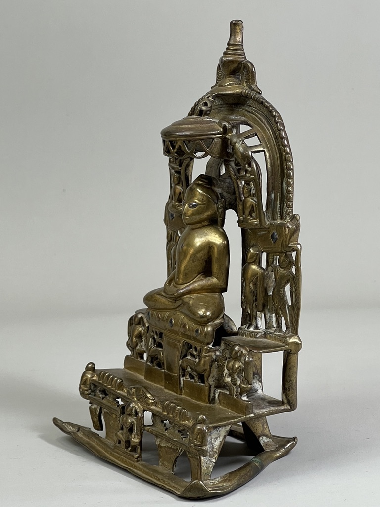 A Bronze Jain shrine. India 15th century.A Jain shrine depicting a Tirthankara with silver inlaid - Image 4 of 18