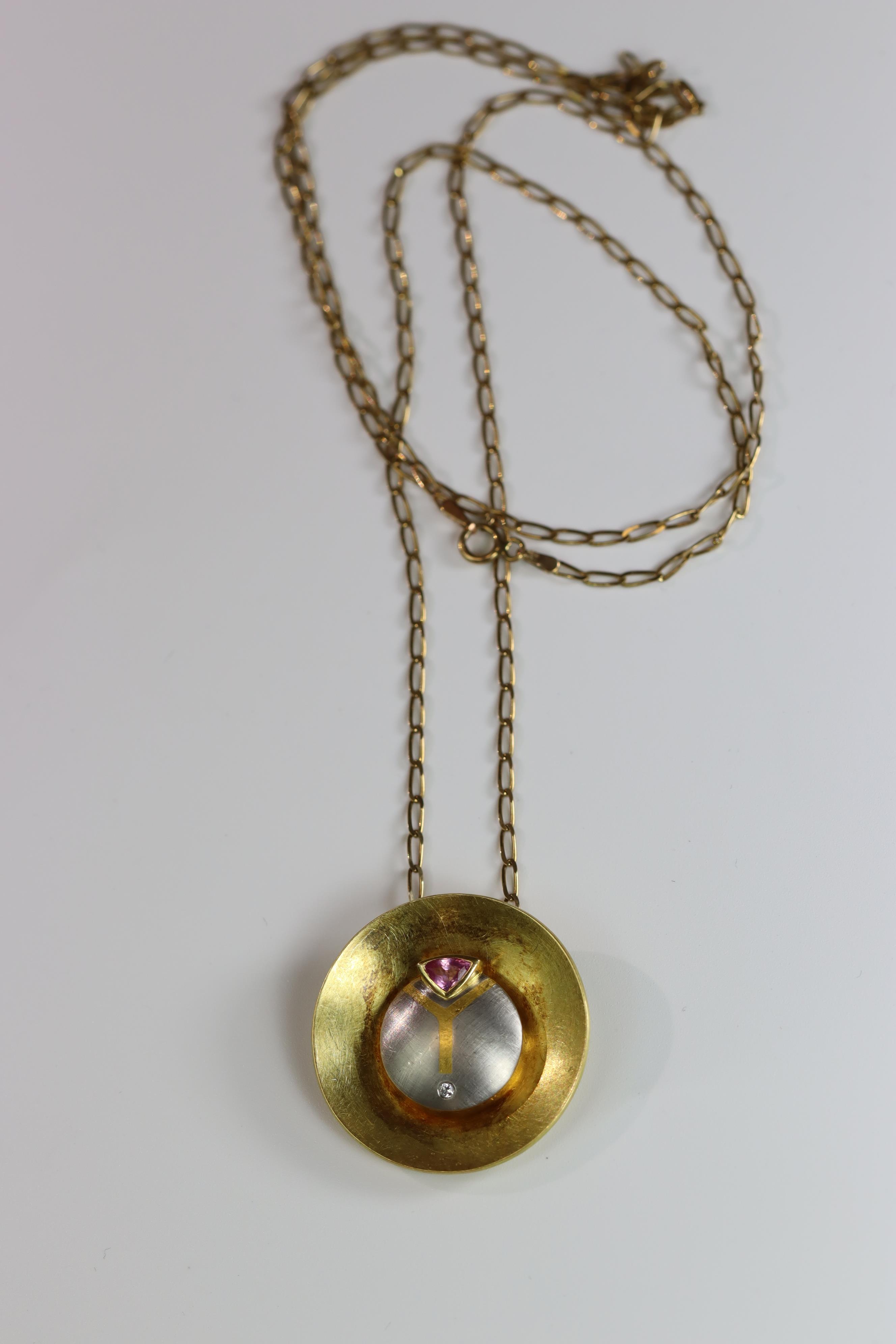 An Unusual Gold, Platinum, Diamond and Ruby Disc Pendant, on a long chain, chain set in 9 ct gold, - Image 4 of 10