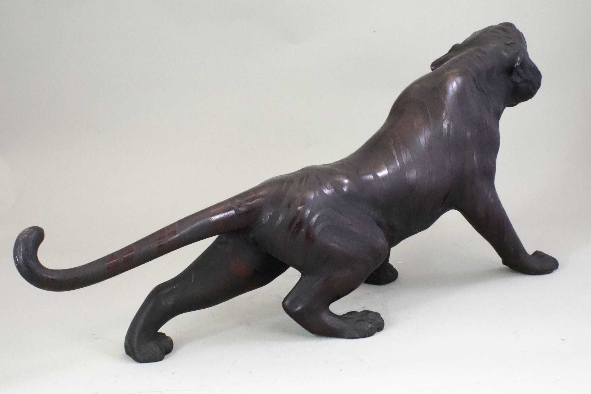 A Japanese Bronze Okimino of Tiger. Meiji Period.with glass eyes, and depicted snarling. Provenance: - Image 5 of 8