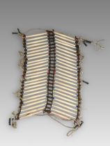 Native American Plains Breastplate. USA ca. Late 19th Century.A wonderful breast plate made ofÂ