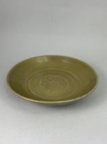 A Celadon Dish, Ming dynasty,and Qingbai Dish, Yuan dynastythe celadon dish with impressed central
