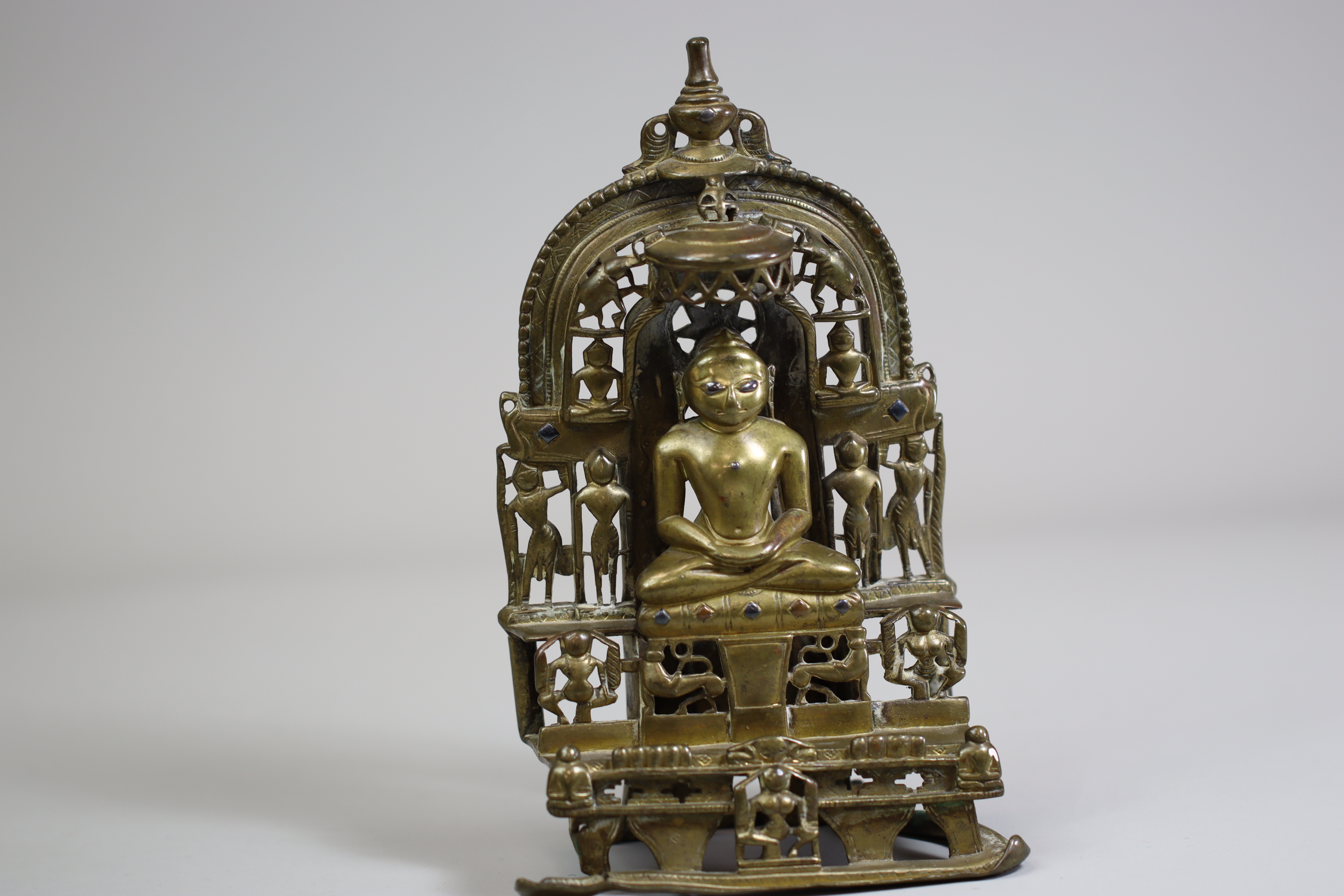 A Bronze Jain shrine. India 15th century.A Jain shrine depicting a Tirthankara with silver inlaid - Image 18 of 18