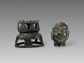 A Repousse Copper Monk's Head, and an openwork Bronze Lotus Stand, c.1800A Repousse Copper Monk's