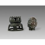 A Repousse Copper Monk's Head, and an openwork Bronze Lotus Stand, c.1800A Repousse Copper Monk's