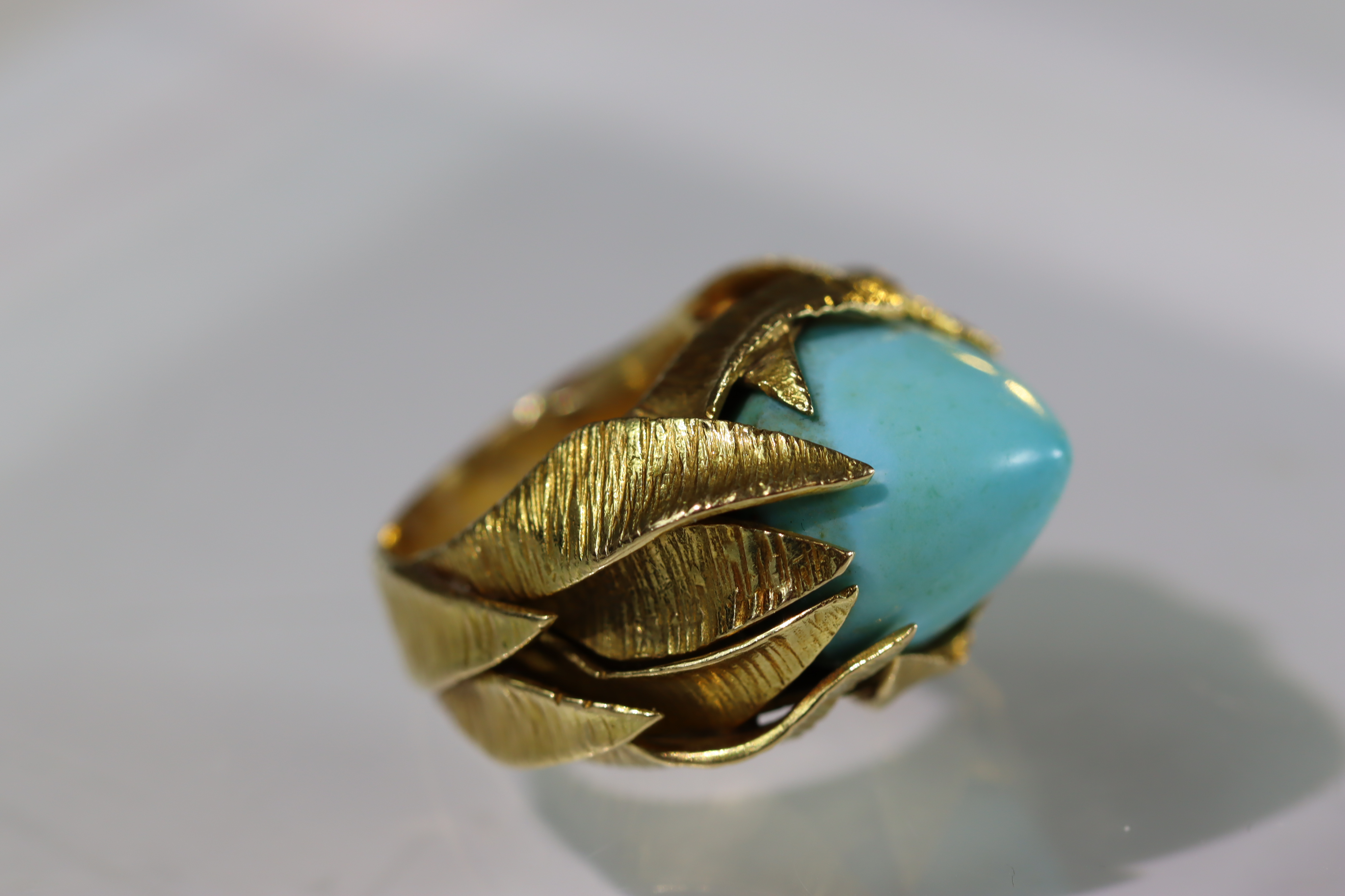 A Turquoise set 18ct gold ring . French gold marks and makers marks on exterior of shank. Signed - Image 3 of 10