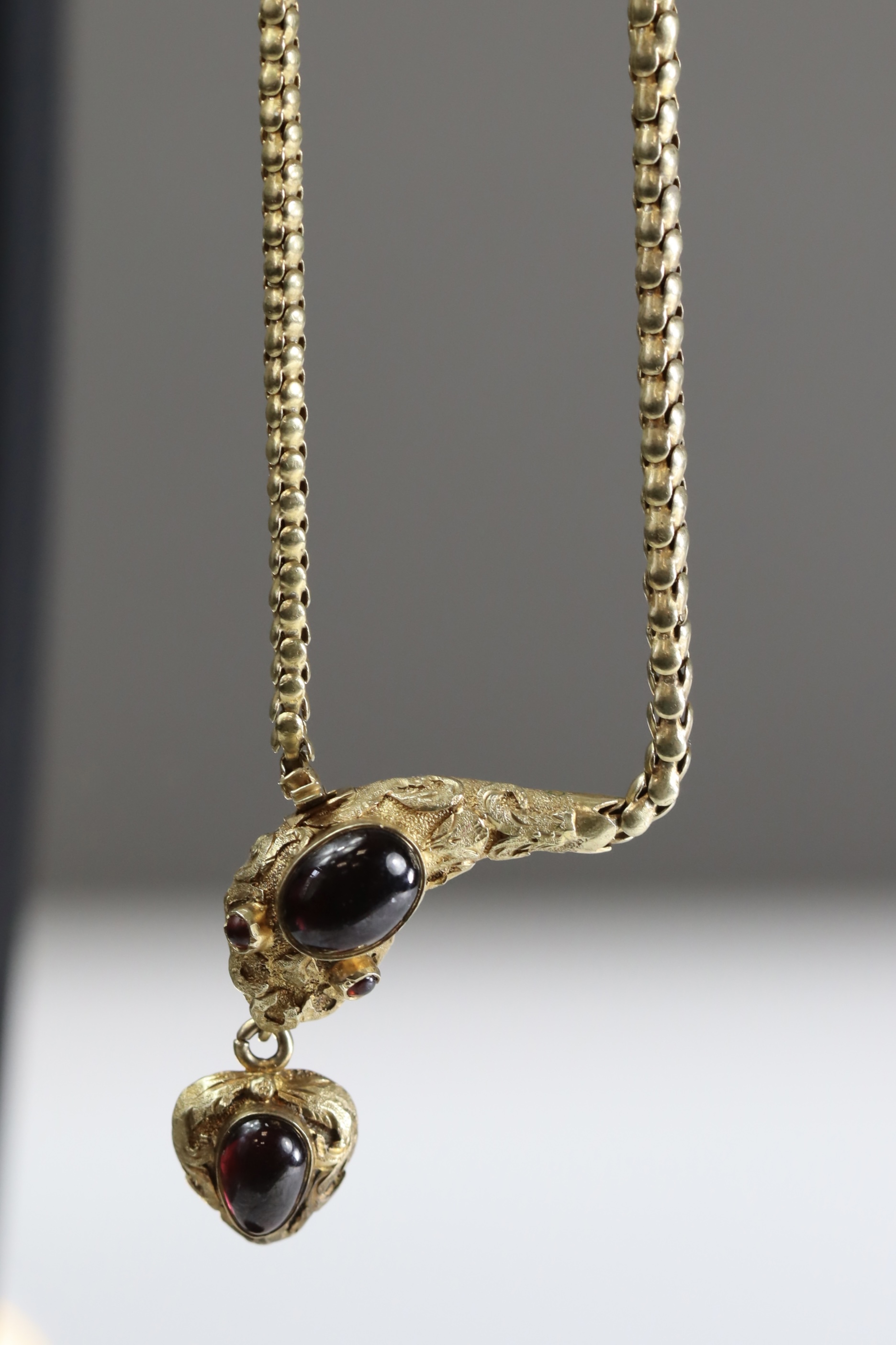 An Attractive Antique Cabochon Garnet and Yellow Gold Snake Pendant, circa 1870,the head formed from - Image 8 of 10