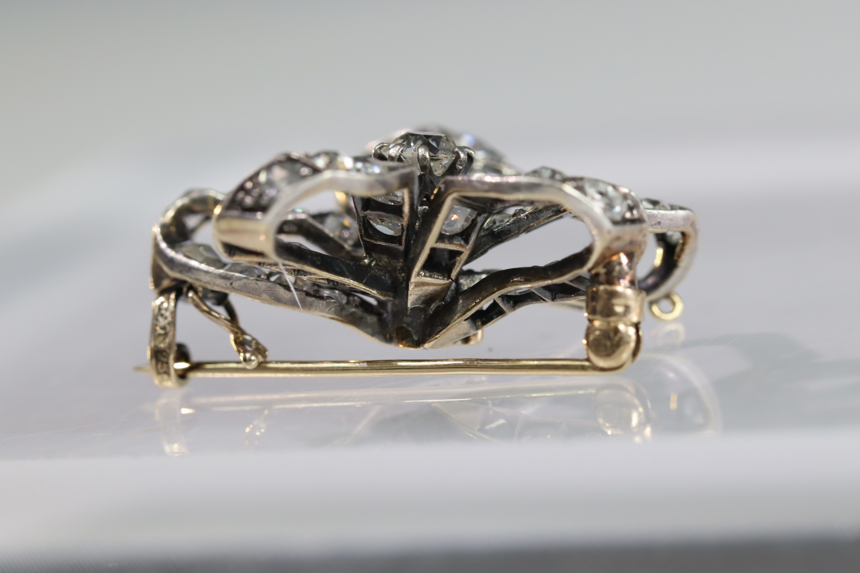 An Antique Diamond and a rose-cut Diamond Stylised Bow Brooch, circa 1890, centrally set with a - Image 11 of 13