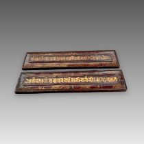 A Pair of inscribed Sutra Covers, Nepal, 19/20th centuryin gilt on red, the inscription with