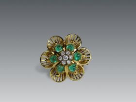 A 1950s Diamond, Cabochon Emerald and Yellow Gold Cluster Clip Brooch, set to the centre with a