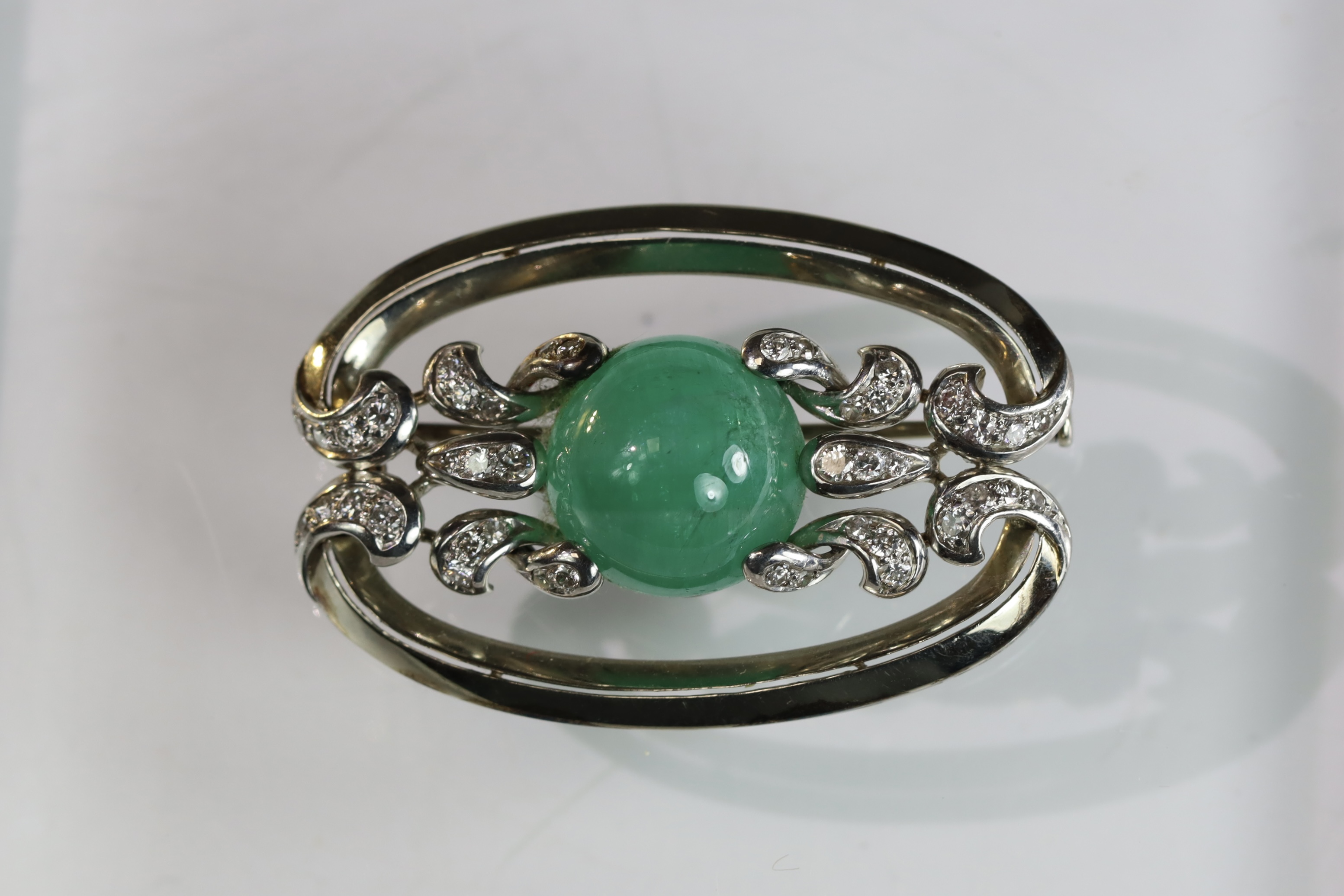 An Impressive 1940s Cabochon Emerald Diamond Brooch, set to the centre with a circular cabochon - Image 3 of 12