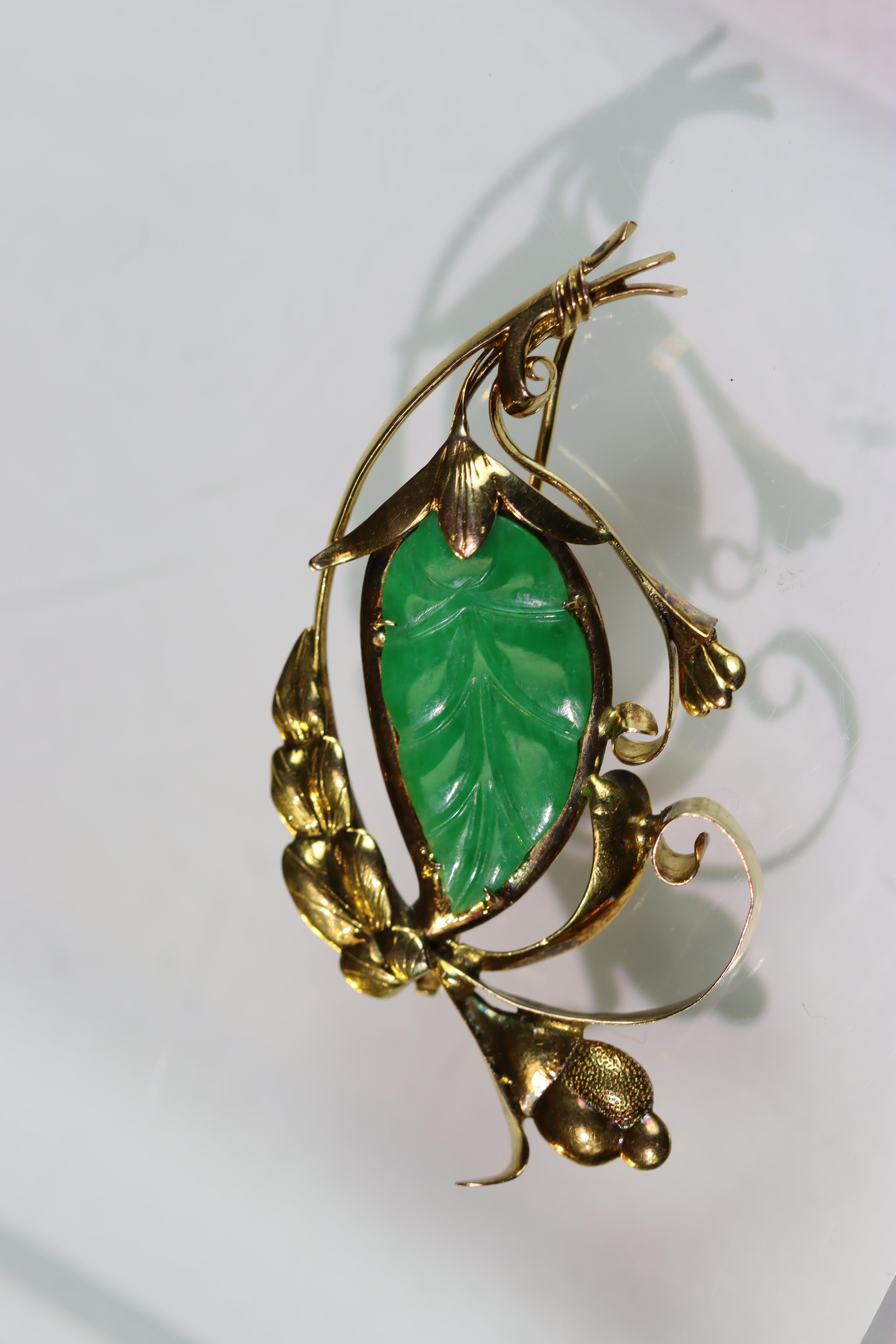 A 1940's Jadeite Brooch the strong apple green coloured jadeite carved as a leaf, with yellow - Image 5 of 7