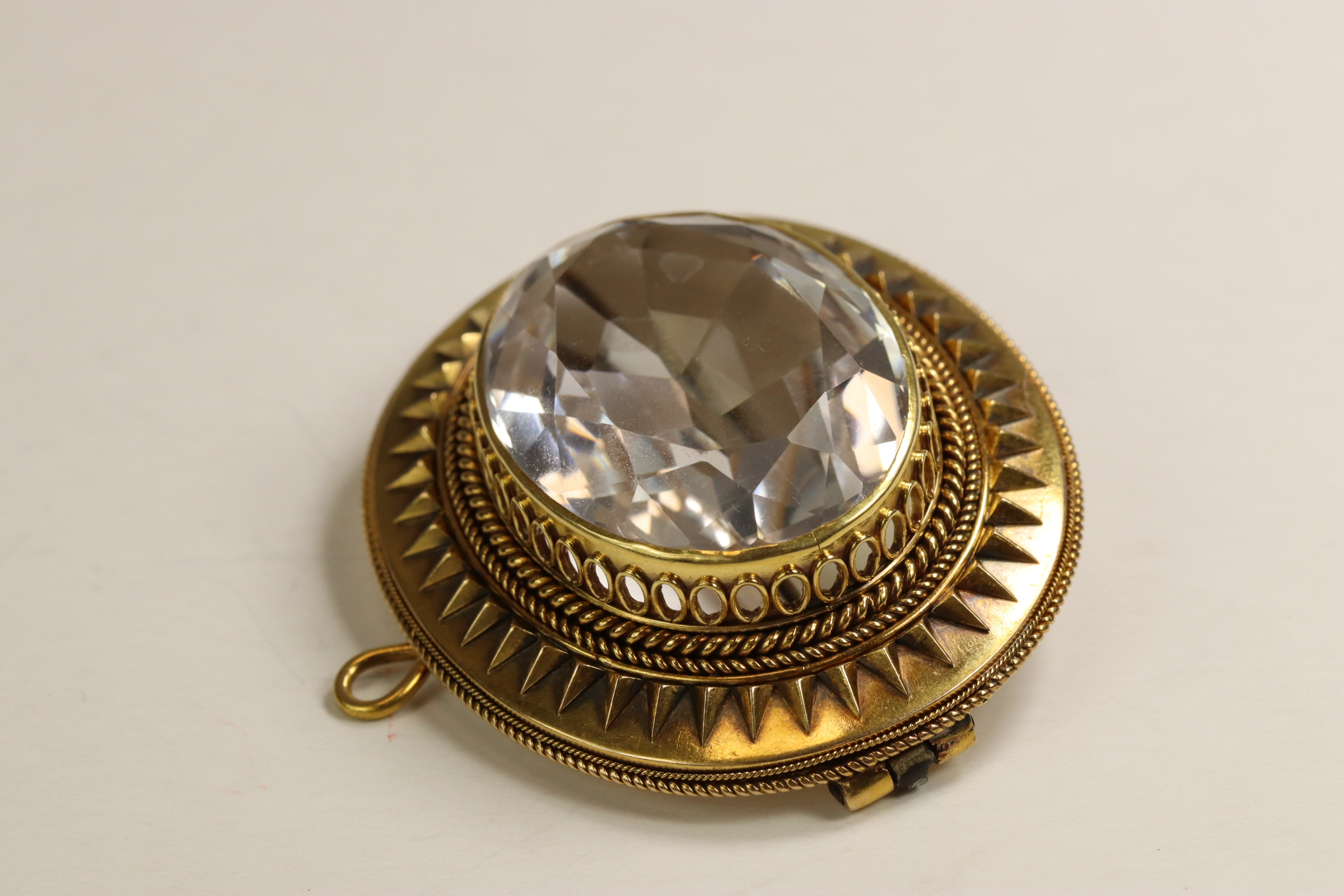 A Victorian 15/18 ct Yellow Gold and Rock Crystal Brooch, circa 1870 The large oval mixed-cut - Image 4 of 7