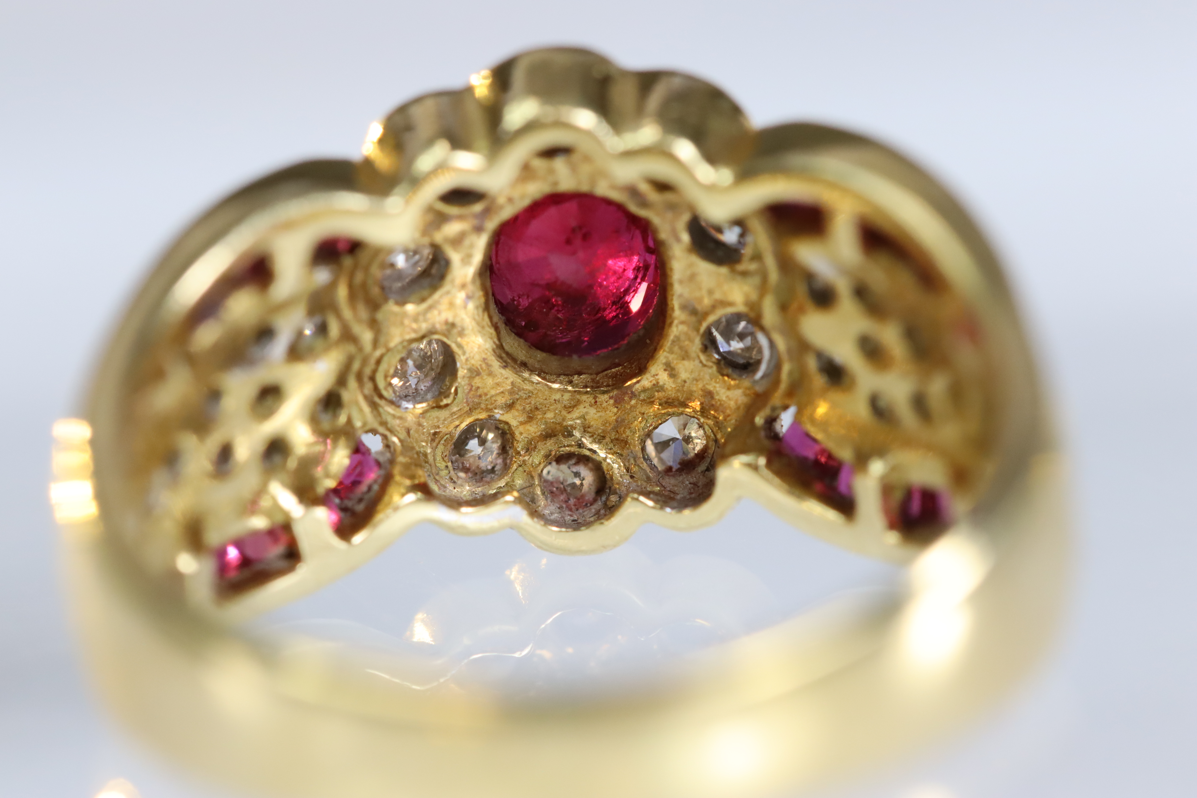 A contemporary 18 carat Yellow Gold, Ruby and Diamond Dress Ring,the oval shaped ruby central - Image 8 of 14