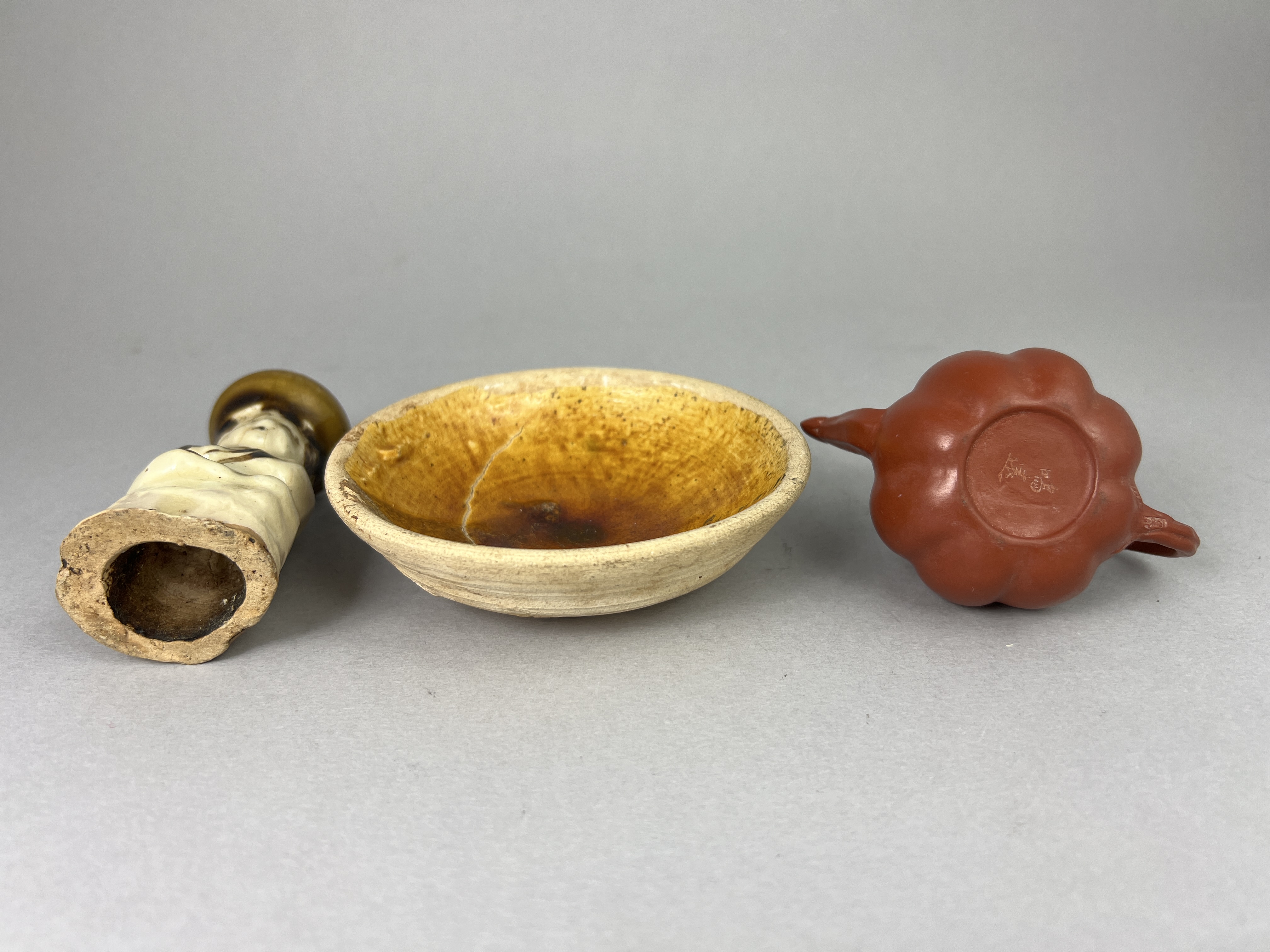 Three Ceramic Pieces, 19th century and earliercomprising a miniature Yixing teapot, an amber - Image 4 of 6