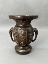 A Japanese Bronze double handled Vase, Meiji periodThe sides with panels of figure scenes, H:14cm,