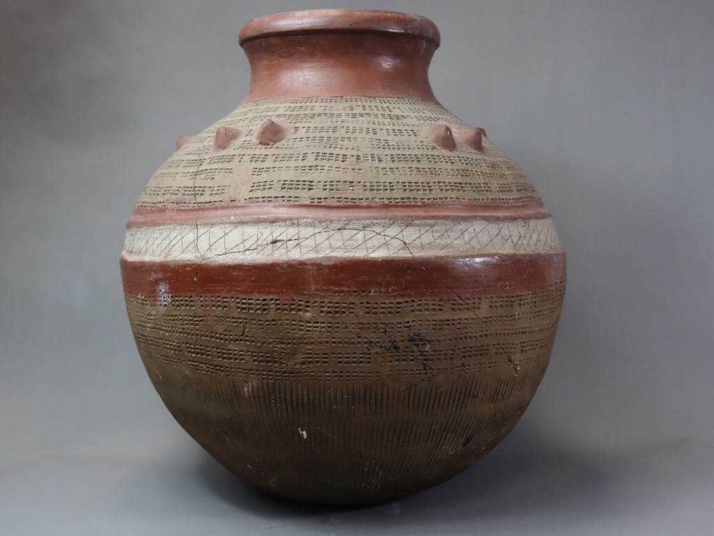 A large Nigerian vesselpottery, spherical with five pairs of mounds to the shoulders and with - Image 3 of 7
