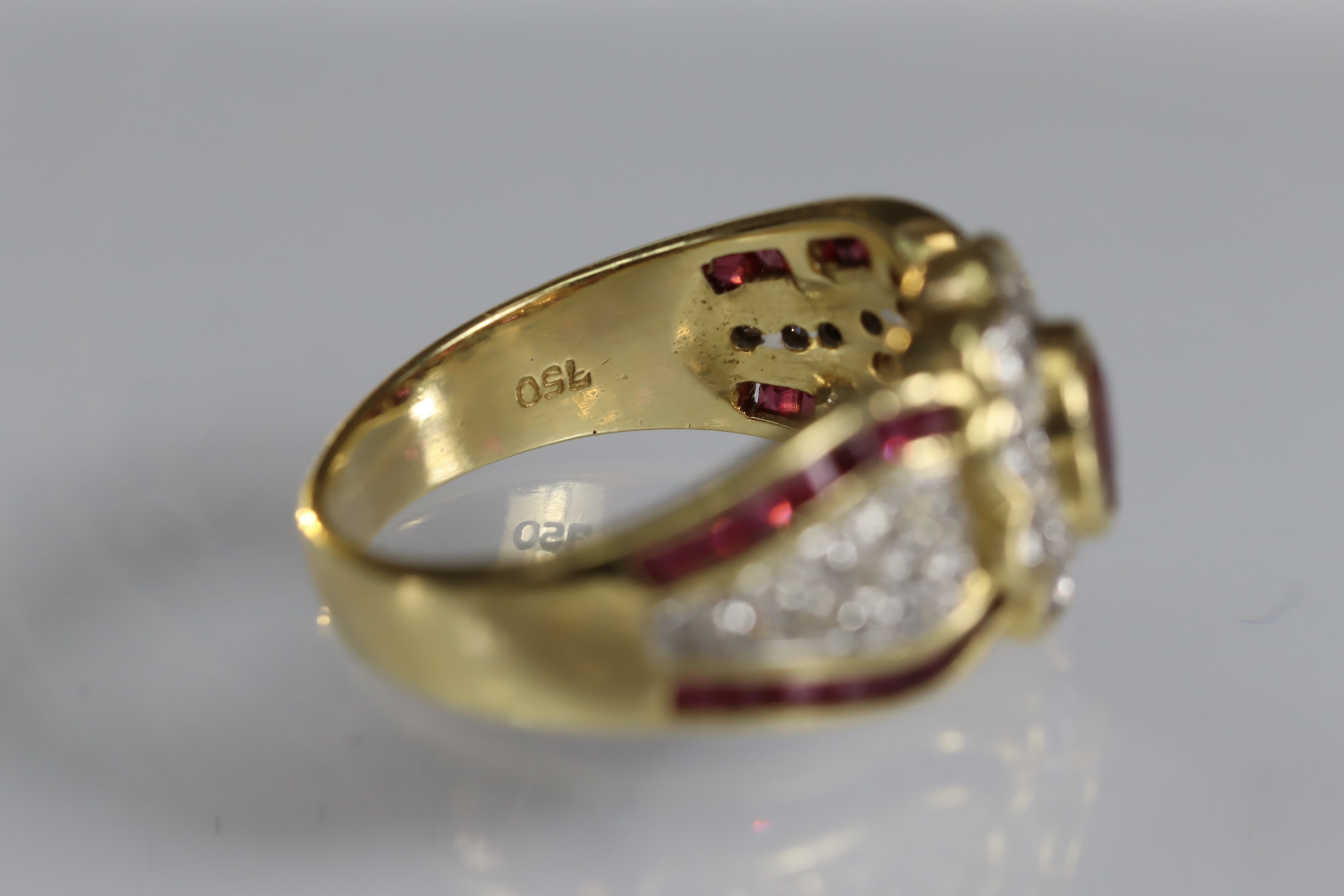 A contemporary 18 carat Yellow Gold, Ruby and Diamond Dress Ring,the oval shaped ruby central - Image 14 of 14