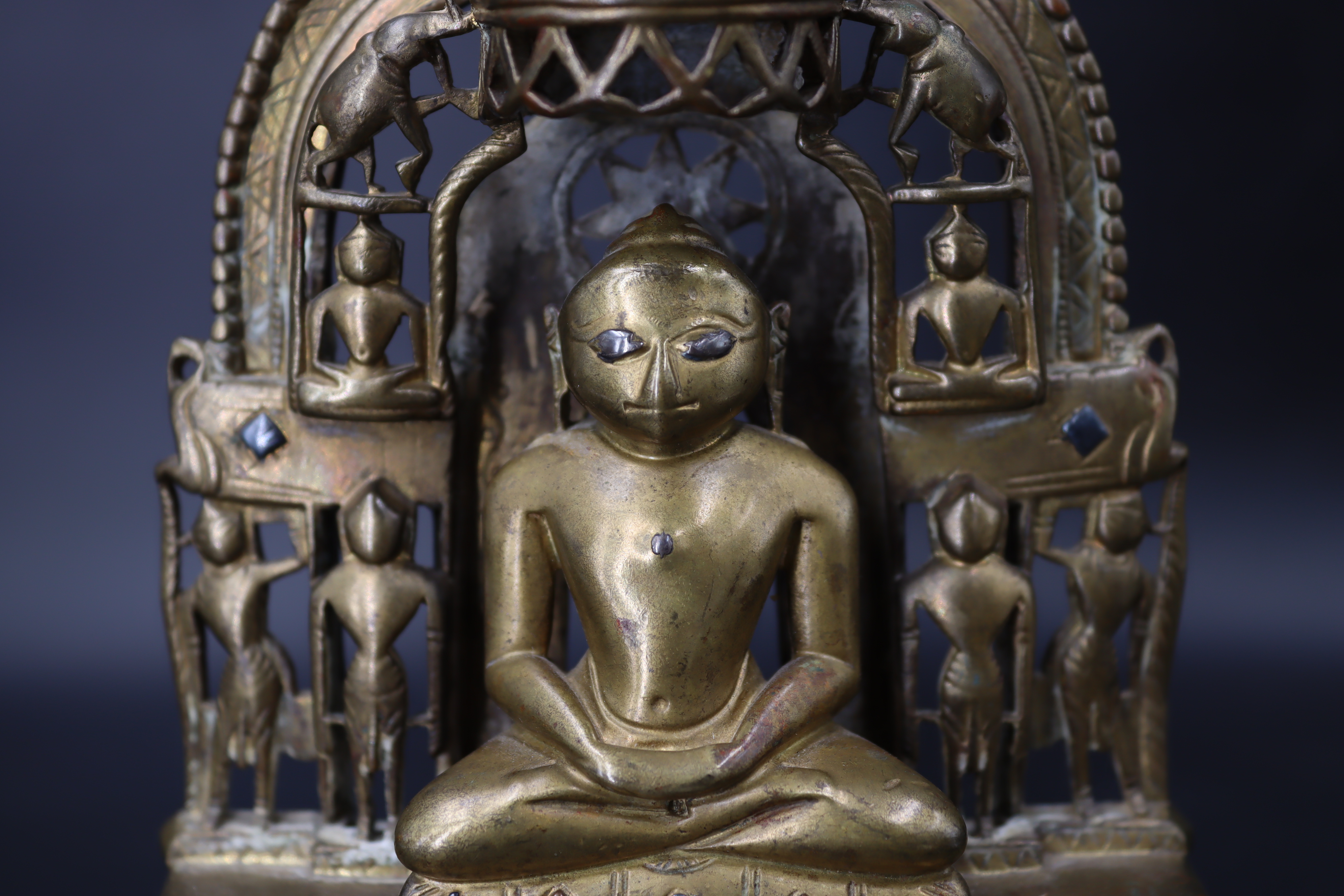 A Bronze Jain shrine. India 15th century.A Jain shrine depicting a Tirthankara with silver inlaid - Image 15 of 18