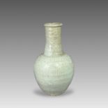 A Qingbai moulded Bottle, Yuan dynastythe ovoid body and waisted neck with tiers of contrasting