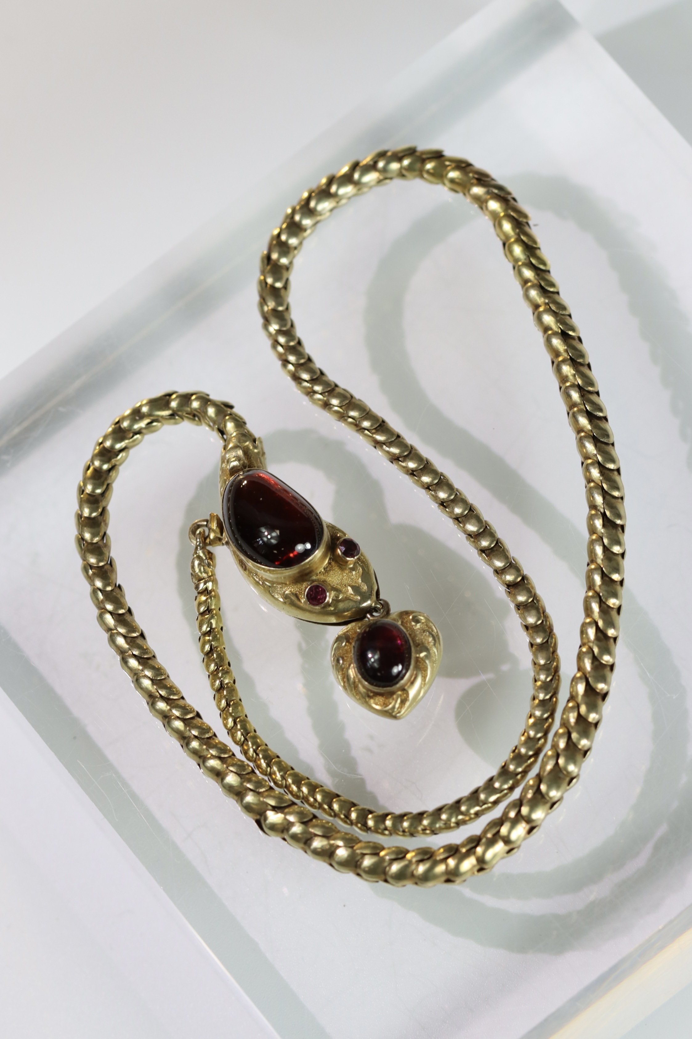An attractive Antique Cabochon Garnet and Yellow Gold Snake Pendant, circa 1870,the head formed from - Image 12 of 13