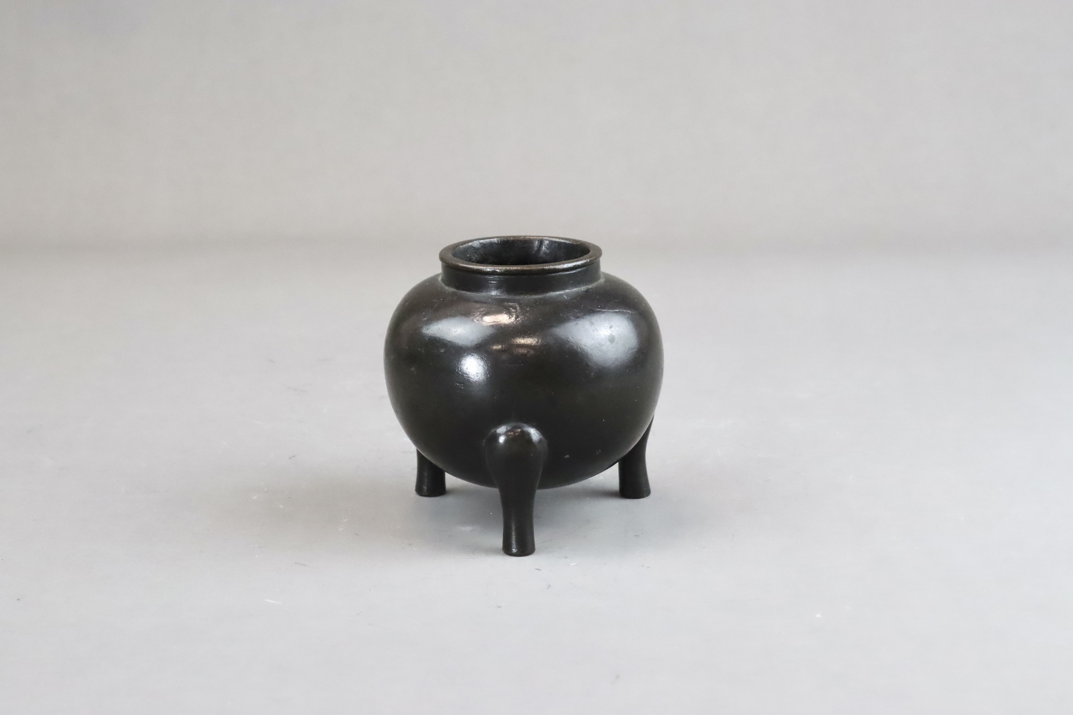 A Globular Bronze Tripod Waterpot, li ding, Ming dynasty - Image 2 of 5