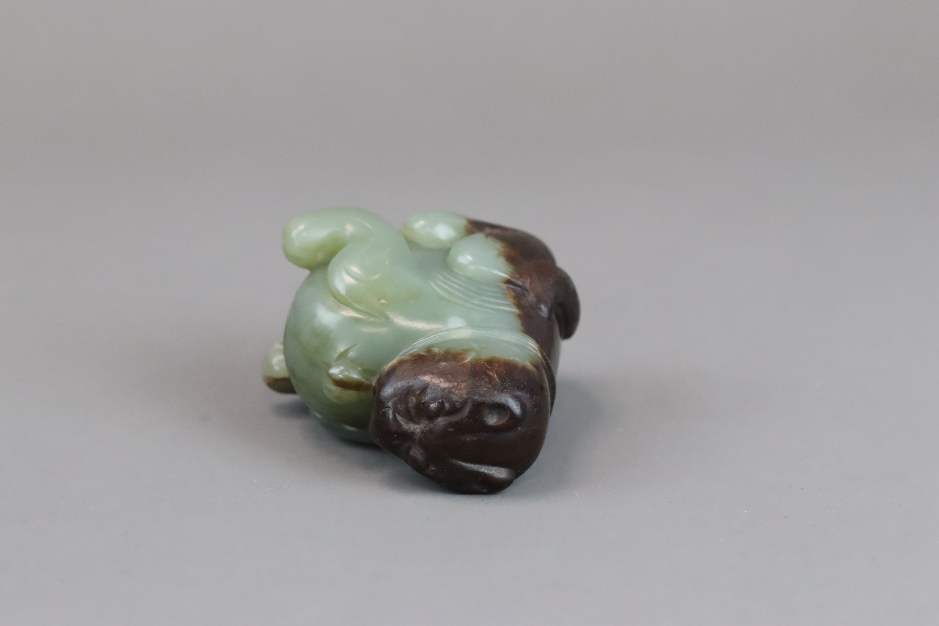 A Green and Brown Jade Seated Lion, Ming dynasty, - Image 3 of 10