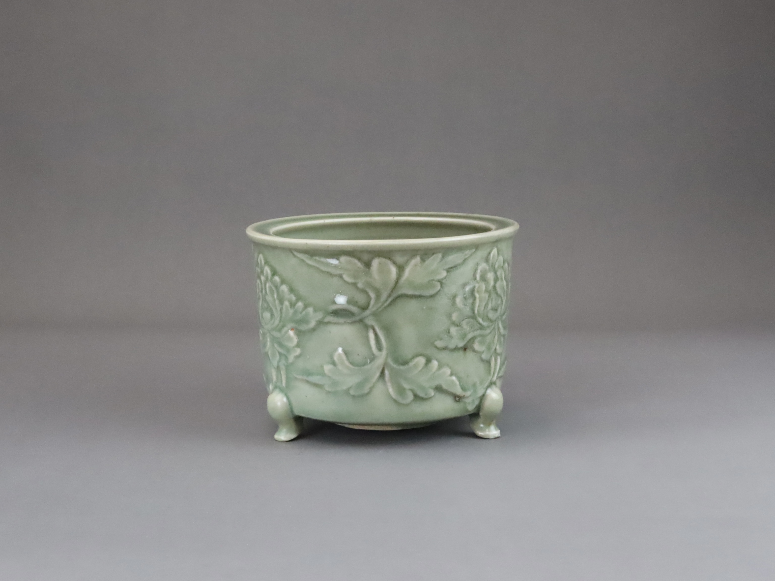 A Longquan Celadon Peony Tripod Censer, early Ming dynasty,  - Image 7 of 14