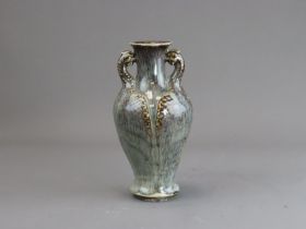 A Shiwan Moulded Vase, late Qing dynasty