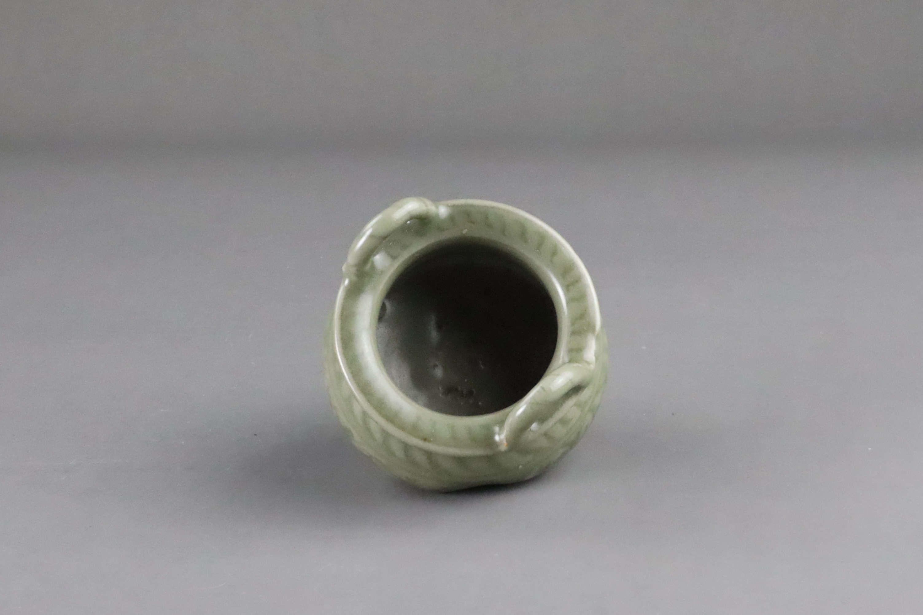 A Carved Longquan Celadon Tripod Incense Burner, early Ming dynasty - Image 10 of 11